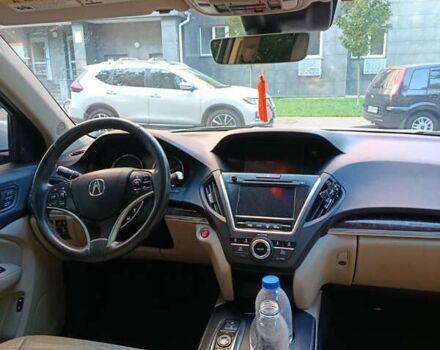 Белый Акура МДХ, объемом двигателя 3.47 л и пробегом 100 тыс. км за 28000 $, фото 3 на Automoto.ua