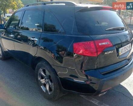 Черный Акура МДХ, объемом двигателя 3.7 л и пробегом 130 тыс. км за 13000 $, фото 2 на Automoto.ua