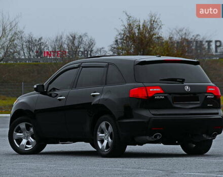 Черный Акура МДХ, объемом двигателя 3.7 л и пробегом 132 тыс. км за 11800 $, фото 1 на Automoto.ua