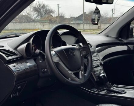 Черный Акура МДХ, объемом двигателя 3.7 л и пробегом 132 тыс. км за 9350 $, фото 1 на Automoto.ua