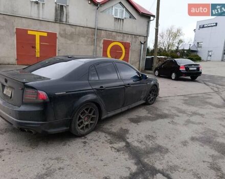 Черный Акура ТЛ, объемом двигателя 3.47 л и пробегом 262 тыс. км за 6000 $, фото 1 на Automoto.ua