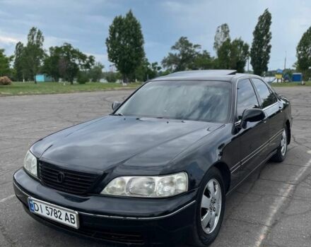 Черный Акура ТЛ, объемом двигателя 3.5 л и пробегом 376 тыс. км за 3800 $, фото 1 на Automoto.ua
