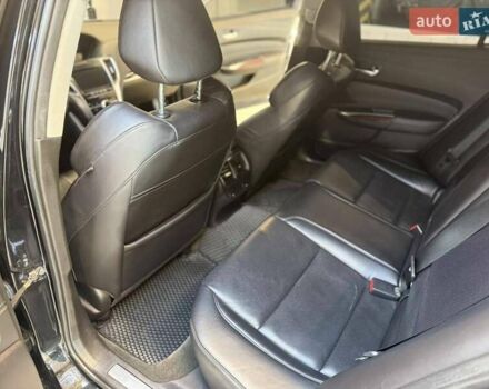 Черный Акура ТЛХ, объемом двигателя 2.36 л и пробегом 166 тыс. км за 14500 $, фото 24 на Automoto.ua