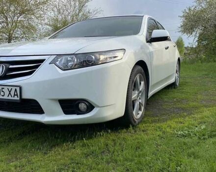 Белый Акура ТСХ, объемом двигателя 2.4 л и пробегом 230 тыс. км за 12300 $, фото 1 на Automoto.ua