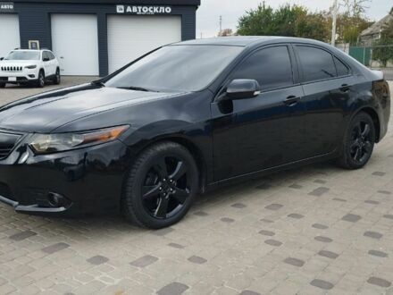 Черный Акура ТСХ, объемом двигателя 2.4 л и пробегом 184 тыс. км за 11000 $, фото 1 на Automoto.ua