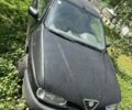 Черный Альфа 145, объемом двигателя 1.7 л и пробегом 10 тыс. км за 1100 $, фото 1 на Automoto.ua