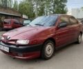 Красный Альфа 146, объемом двигателя 1.6 л и пробегом 218 тыс. км за 1750 $, фото 1 на Automoto.ua