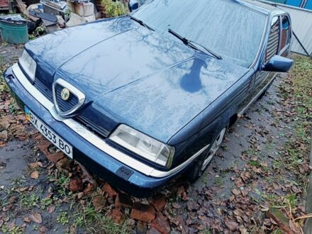 Синий Альфа 164, объемом двигателя 2.5 л и пробегом 235 тыс. км за 2200 $, фото 1 на Automoto.ua