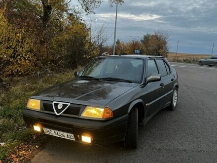 Серый Альфа 33, объемом двигателя 1.4 л и пробегом 250 тыс. км за 1250 $, фото 1 на Automoto.ua