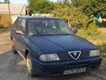 Синий Альфа 33, объемом двигателя 1.4 л и пробегом 264 тыс. км за 600 $, фото 1 на Automoto.ua