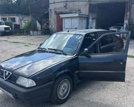 Чорний Альфа Ромео 145, об'ємом двигуна 1.4 л та пробігом 250 тис. км за 918 $, фото 1 на Automoto.ua