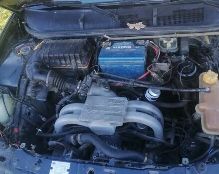 Черный Альфа Ромео 145, объемом двигателя 1.4 л и пробегом 285 тыс. км за 1700 $, фото 1 на Automoto.ua