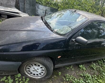 Черный Альфа Ромео 145, объемом двигателя 1.7 л и пробегом 10 тыс. км за 900 $, фото 2 на Automoto.ua