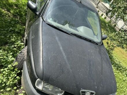 Черный Альфа Ромео 145, объемом двигателя 1.7 л и пробегом 10 тыс. км за 900 $, фото 1 на Automoto.ua