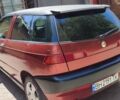 Красный Альфа Ромео 145, объемом двигателя 1.6 л и пробегом 237 тыс. км за 1599 $, фото 1 на Automoto.ua