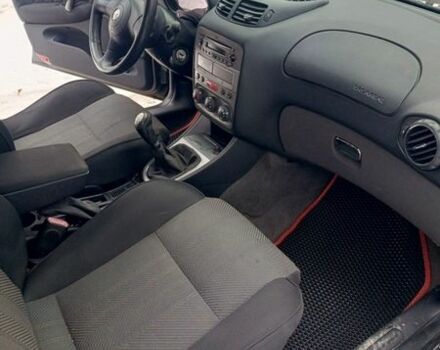 Черный Альфа Ромео 147, объемом двигателя 1.6 л и пробегом 240 тыс. км за 2950 $, фото 18 на Automoto.ua