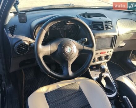 Черный Альфа Ромео 147, объемом двигателя 1.91 л и пробегом 319 тыс. км за 4800 $, фото 7 на Automoto.ua