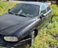 Черный Альфа Ромео 156, объемом двигателя 2 л и пробегом 140 тыс. км за 1350 $, фото 1 на Automoto.ua