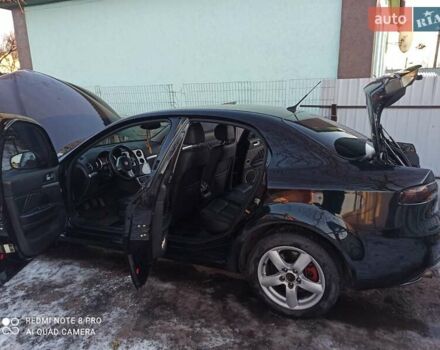 Чорний Альфа Ромео 159, об'ємом двигуна 1.9 л та пробігом 188 тис. км за 6120 $, фото 12 на Automoto.ua