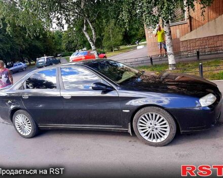 Черный Альфа Ромео 166, объемом двигателя 2.4 л и пробегом 238 тыс. км за 7000 $, фото 1 на Automoto.ua