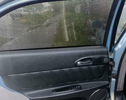 Синій Альфа Ромео 166, об'ємом двигуна 2 л та пробігом 264 тис. км за 1500 $, фото 5 на Automoto.ua