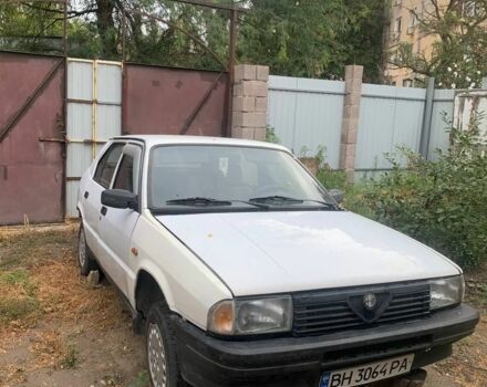 Белый Альфа Ромео 33, объемом двигателя 1.8 л и пробегом 200 тыс. км за 250 $, фото 1 на Automoto.ua