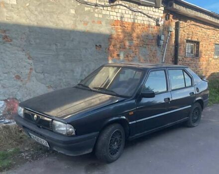 Чорний Альфа Ромео 33, об'ємом двигуна 1.71 л та пробігом 226 тис. км за 998 $, фото 3 на Automoto.ua