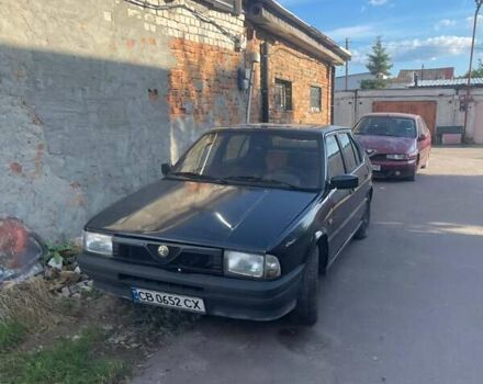 Чорний Альфа Ромео 33, об'ємом двигуна 1.71 л та пробігом 226 тис. км за 998 $, фото 6 на Automoto.ua