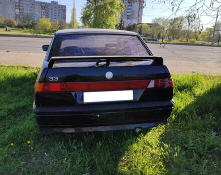 Черный Альфа Ромео 33, объемом двигателя 1.4 л и пробегом 250 тыс. км за 900 $, фото 1 на Automoto.ua