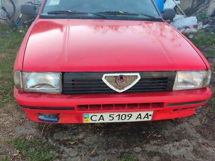 Красный Альфа Ромео 33, объемом двигателя 0.11 л и пробегом 180 тыс. км за 250 $, фото 1 на Automoto.ua