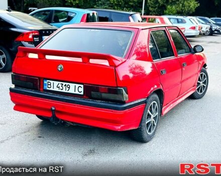 Красный Альфа Ромео 33, объемом двигателя 1.4 л и пробегом 200 тыс. км за 699 $, фото 1 на Automoto.ua