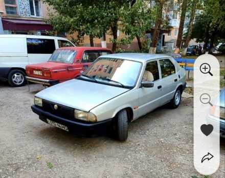 Сірий Альфа Ромео 33, об'ємом двигуна 1.5 л та пробігом 333 тис. км за 1000 $, фото 1 на Automoto.ua