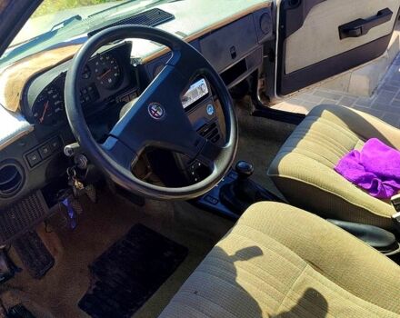 Сірий Альфа Ромео 33, об'ємом двигуна 1.6 л та пробігом 425 тис. км за 800 $, фото 11 на Automoto.ua