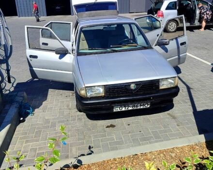 Сірий Альфа Ромео 33, об'ємом двигуна 1.6 л та пробігом 425 тис. км за 800 $, фото 13 на Automoto.ua