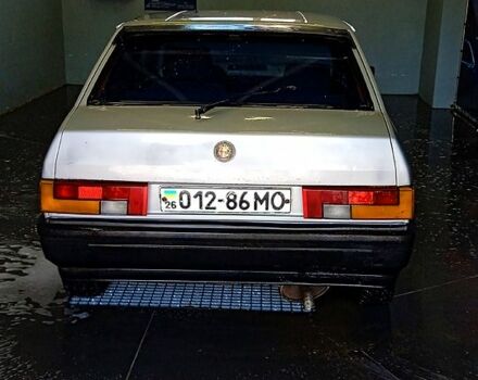 Сірий Альфа Ромео 33, об'ємом двигуна 1.6 л та пробігом 425 тис. км за 800 $, фото 2 на Automoto.ua