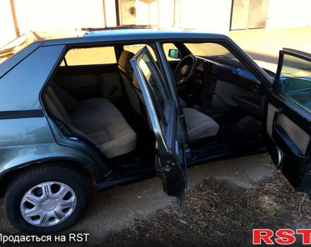 Сірий Альфа Ромео 75, об'ємом двигуна 1.6 л та пробігом 250 тис. км за 900 $, фото 9 на Automoto.ua