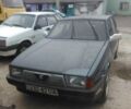Серый Альфа Ромео 75, объемом двигателя 1.8 л и пробегом 100 тыс. км за 500 $, фото 1 на Automoto.ua