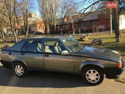 Серый Альфа Ромео 75, объемом двигателя 1.6 л и пробегом 200 тыс. км за 900 $, фото 1 на Automoto.ua