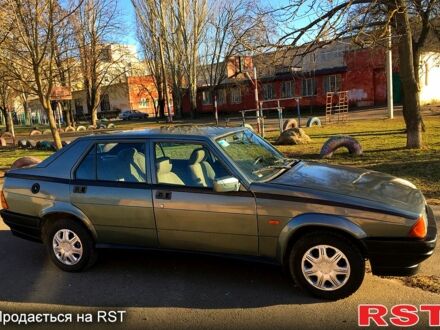 Сірий Альфа Ромео 75, об'ємом двигуна 1.6 л та пробігом 250 тис. км за 900 $, фото 1 на Automoto.ua