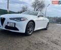 Білий Альфа Ромео Джулія, об'ємом двигуна 2 л та пробігом 107 тис. км за 19500 $, фото 2 на Automoto.ua