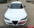 Белый Альфа Ромео Джулия, объемом двигателя 2 л и пробегом 110 тыс. км за 25000 $, фото 1 на Automoto.ua