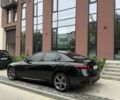 Черный Альфа Ромео Джулия, объемом двигателя 2 л и пробегом 106 тыс. км за 18700 $, фото 1 на Automoto.ua