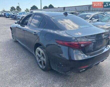 Черный Альфа Ромео Джулия, объемом двигателя 2 л и пробегом 105 тыс. км за 11500 $, фото 1 на Automoto.ua