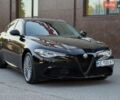 Черный Альфа Ромео Джулия, объемом двигателя 2 л и пробегом 83 тыс. км за 15800 $, фото 1 на Automoto.ua