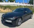 Черный Альфа Ромео Джулия, объемом двигателя 2 л и пробегом 83 тыс. км за 15600 $, фото 2 на Automoto.ua