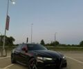 Черный Альфа Ромео Джулия, объемом двигателя 2 л и пробегом 71 тыс. км за 21000 $, фото 1 на Automoto.ua