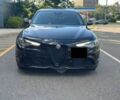 Черный Альфа Ромео Джулия, объемом двигателя 2 л и пробегом 34 тыс. км за 5500 $, фото 1 на Automoto.ua