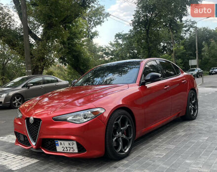 Красный Альфа Ромео Джулия, объемом двигателя 2 л и пробегом 84 тыс. км за 20000 $, фото 1 на Automoto.ua