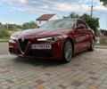 Красный Альфа Ромео Джулия, объемом двигателя 2 л и пробегом 64 тыс. км за 18500 $, фото 1 на Automoto.ua