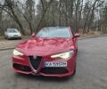 Червоний Альфа Ромео Джулія, об'ємом двигуна 2 л та пробігом 84 тис. км за 25000 $, фото 1 на Automoto.ua
